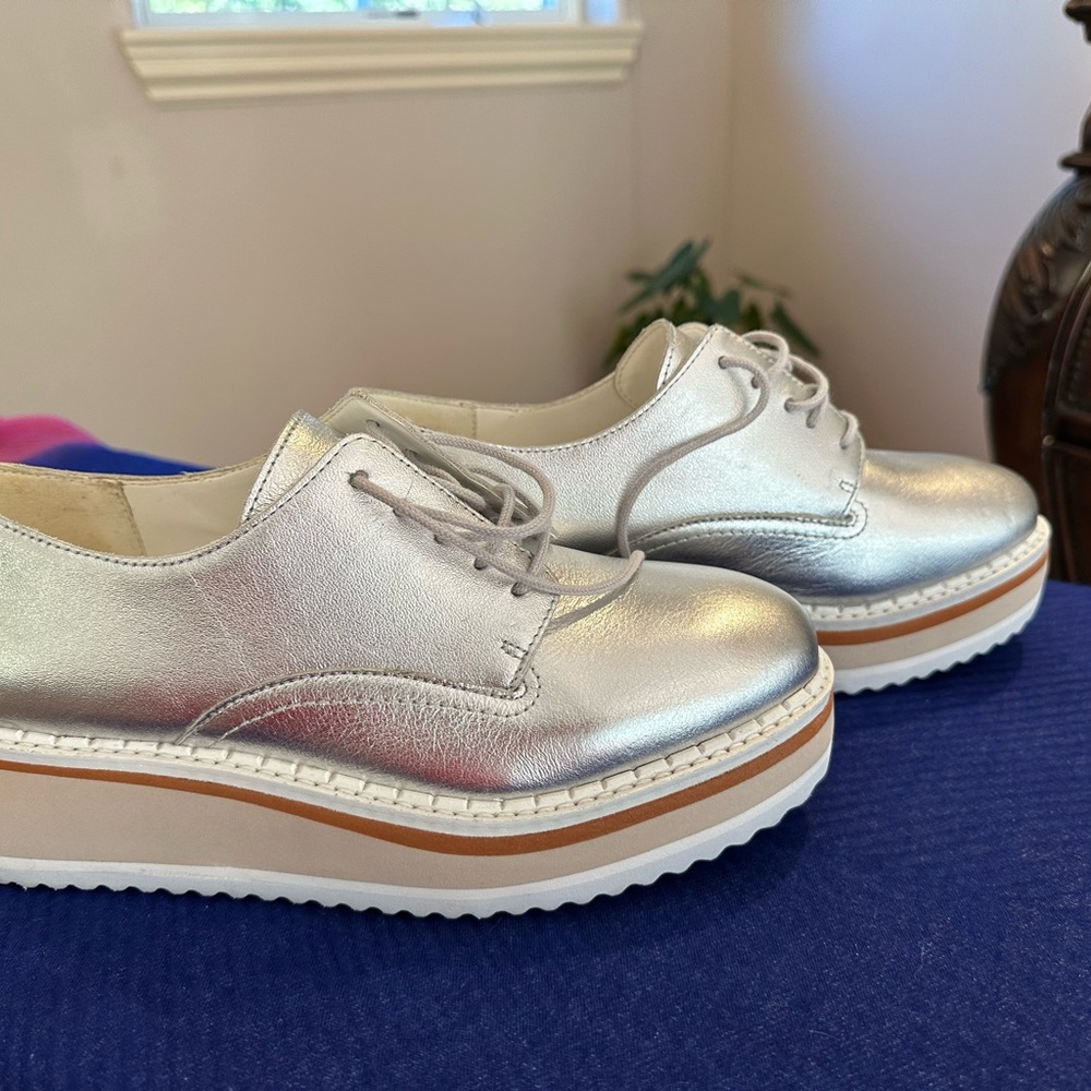 Matisse Women’s Chic/Elegant Metallic Silver Flats with Lace-Up Details